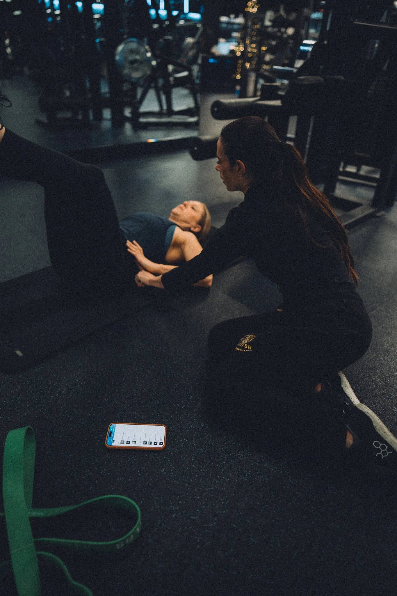 Erika coaching a client during a personal training session